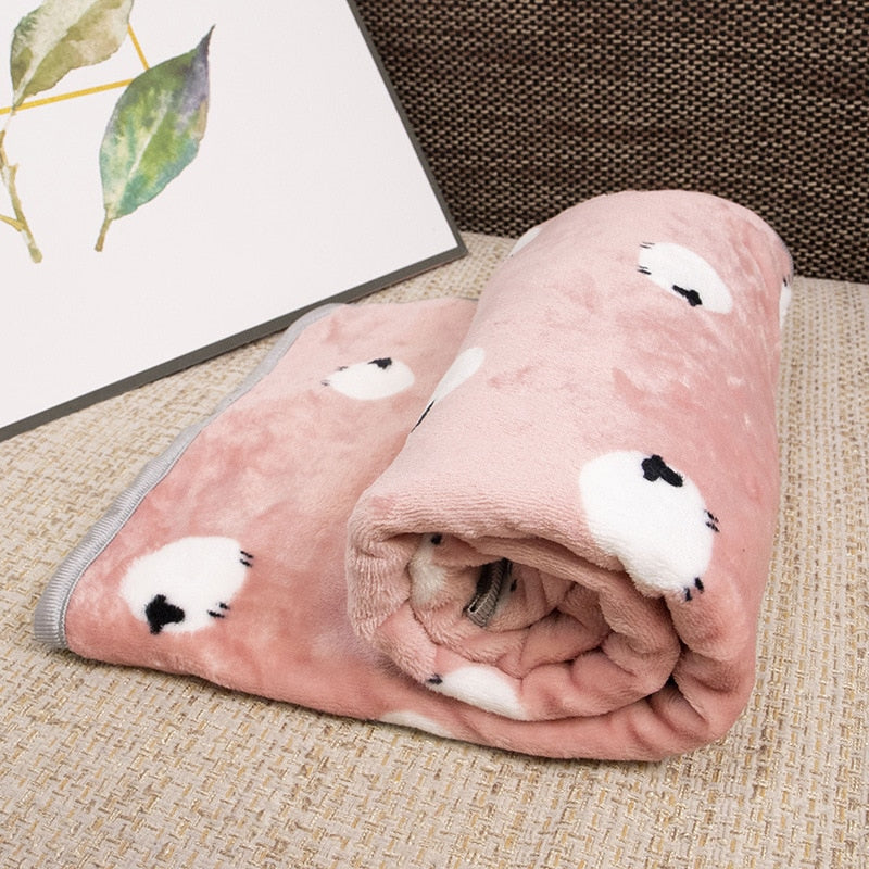 Soft Dog Blanket with animal prints.