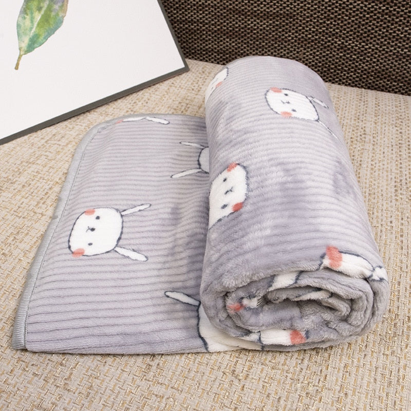 Soft Dog Blanket with animal prints.